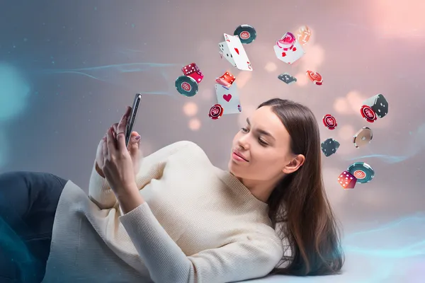 OKTK Casino Games — Enjoy nonstop entertainment A close-up shot of golden coins falling around a spinning roulette wheel, representing immersive casino action at OKTK.